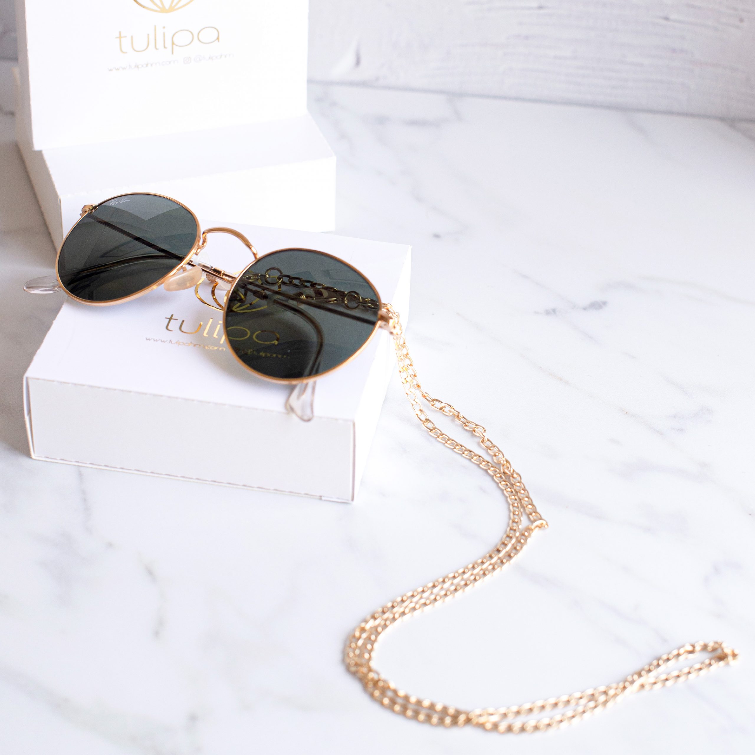 https://www.tulipahm.com/wp-content/uploads/2021/02/Tienda-Tulipa-Joyas-Online-Strap-para-lentes-y-Mascarilla-2.jpeg-1-scaled.jpg